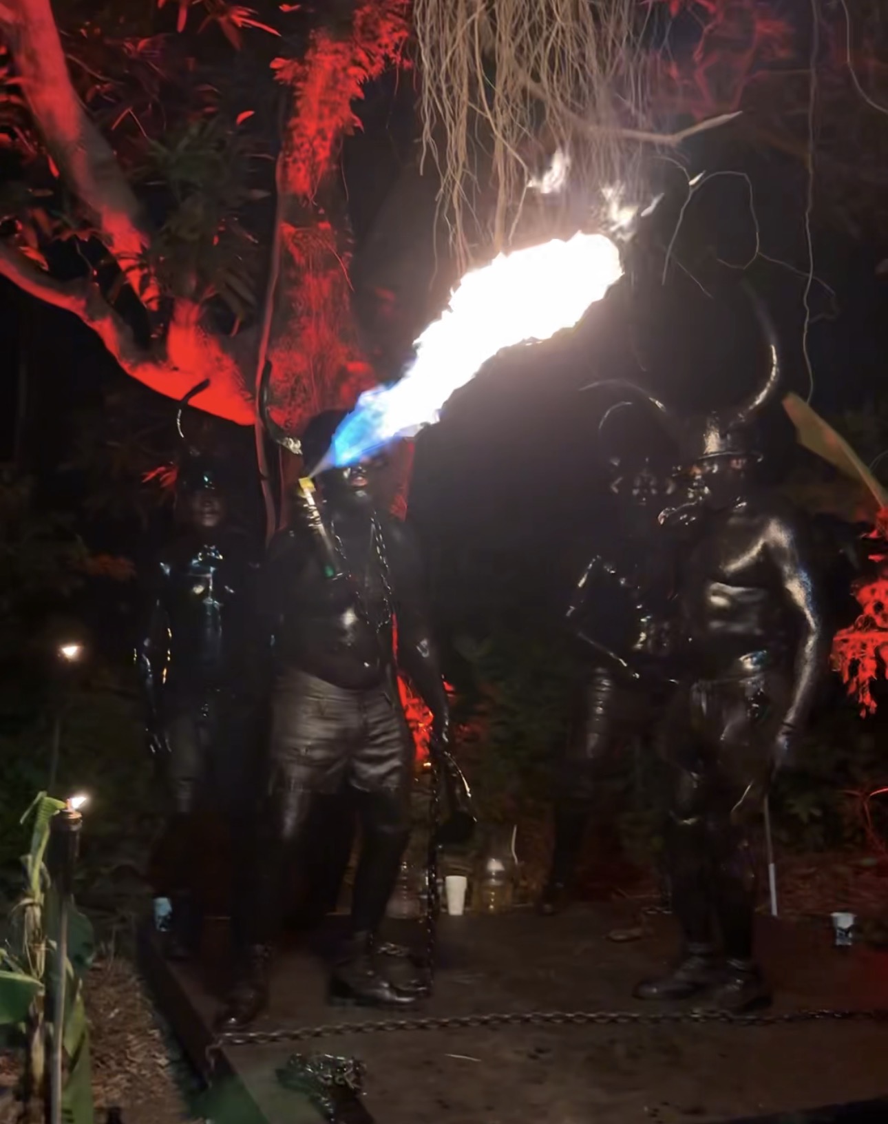 Jab Jab masqueraders performing with fire during Grenada SpiceMas